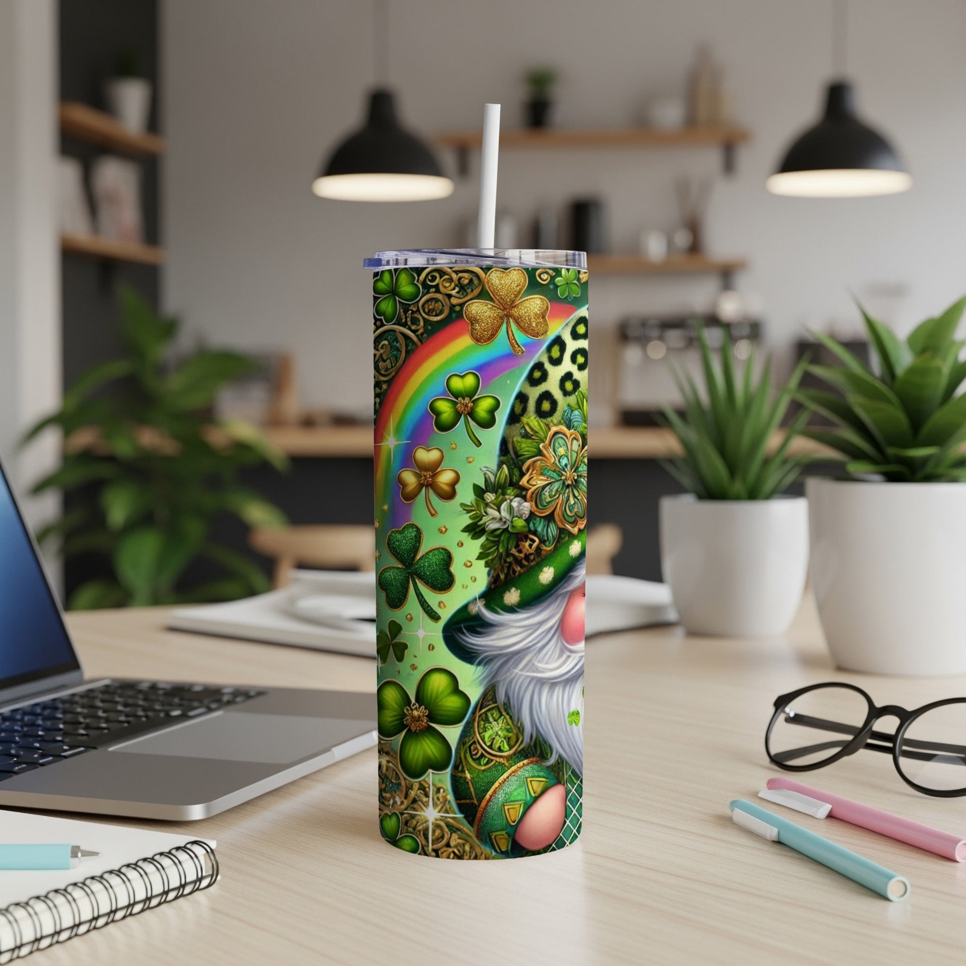 Green gnome with shamrocks and rainbow on a patterned tumbler.