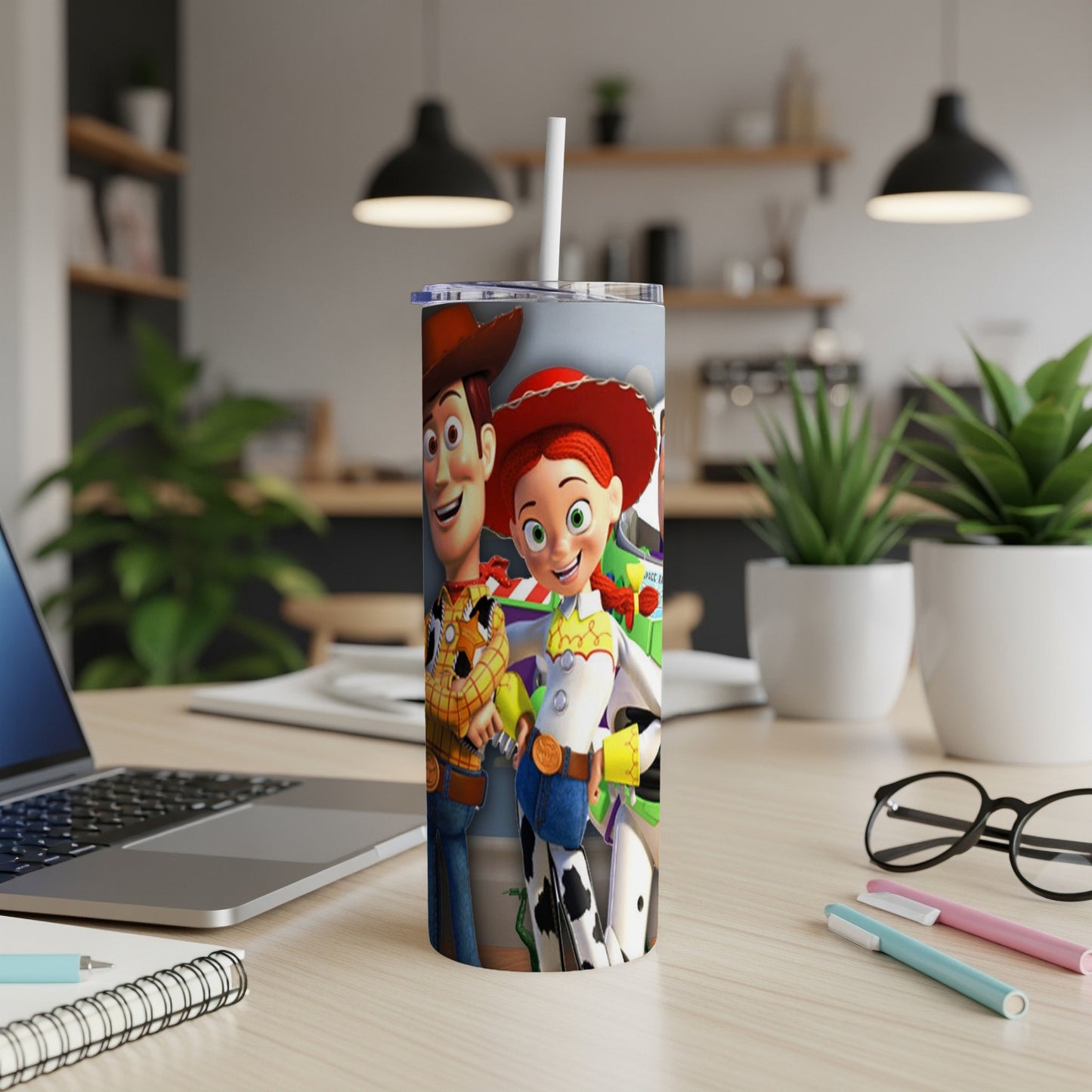 Toy Story characters Woody and Jessie on a white tumbler with a straw.