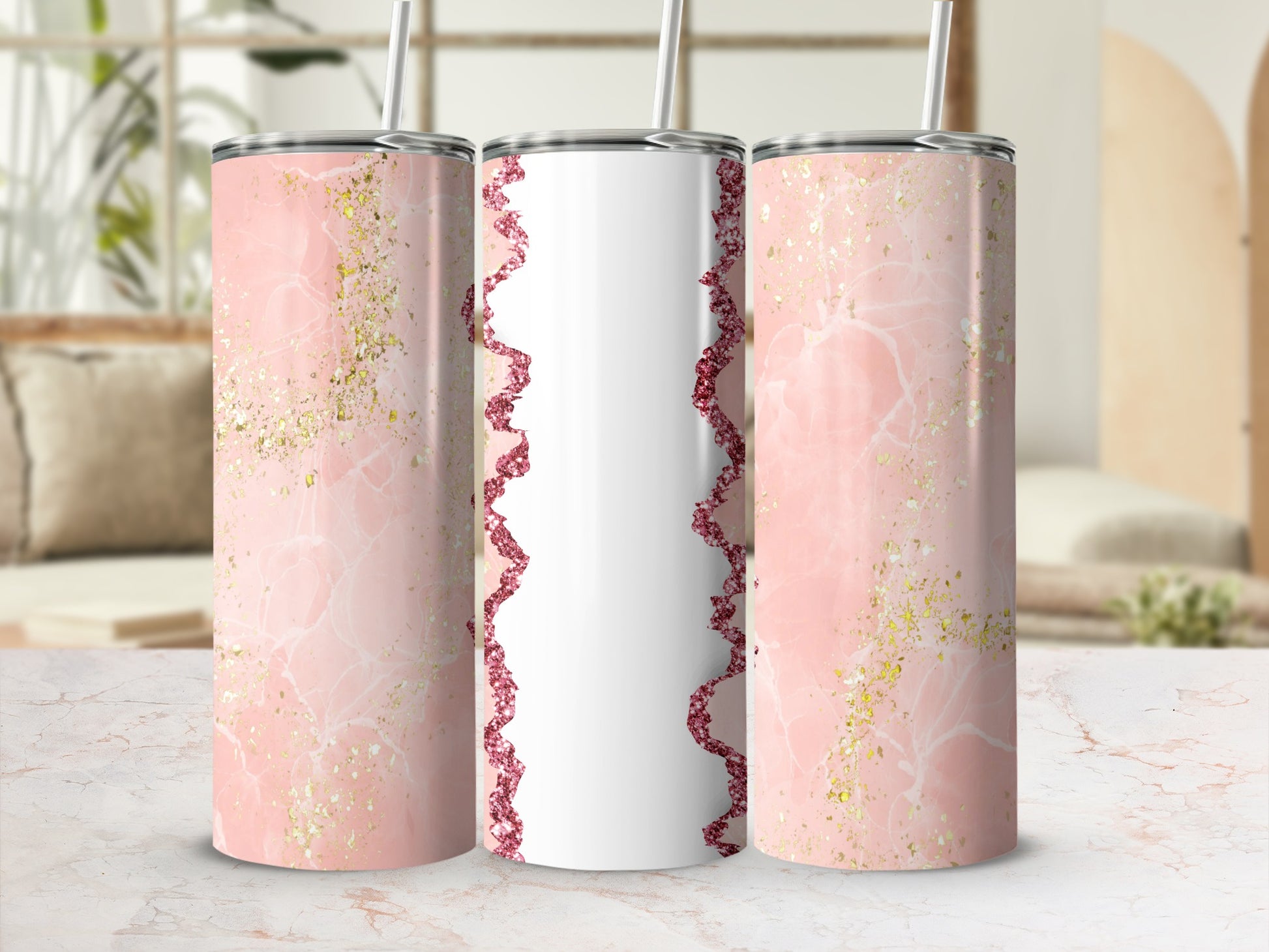 Three tall tumblers with a pink marble and gold glitter design.