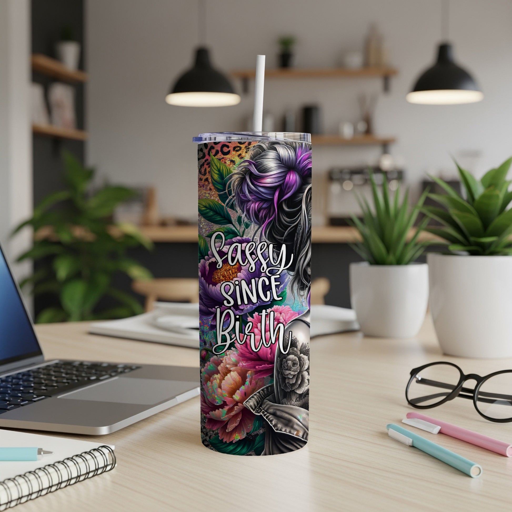 Floral tumbler with "Sassy Since Birth" text and leopard print accents.