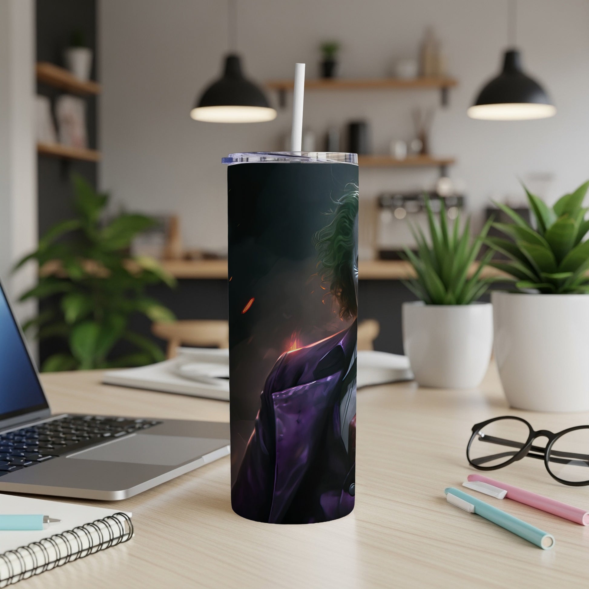 Tumbler featuring an illustration of the Joker with green hair and a purple suit.