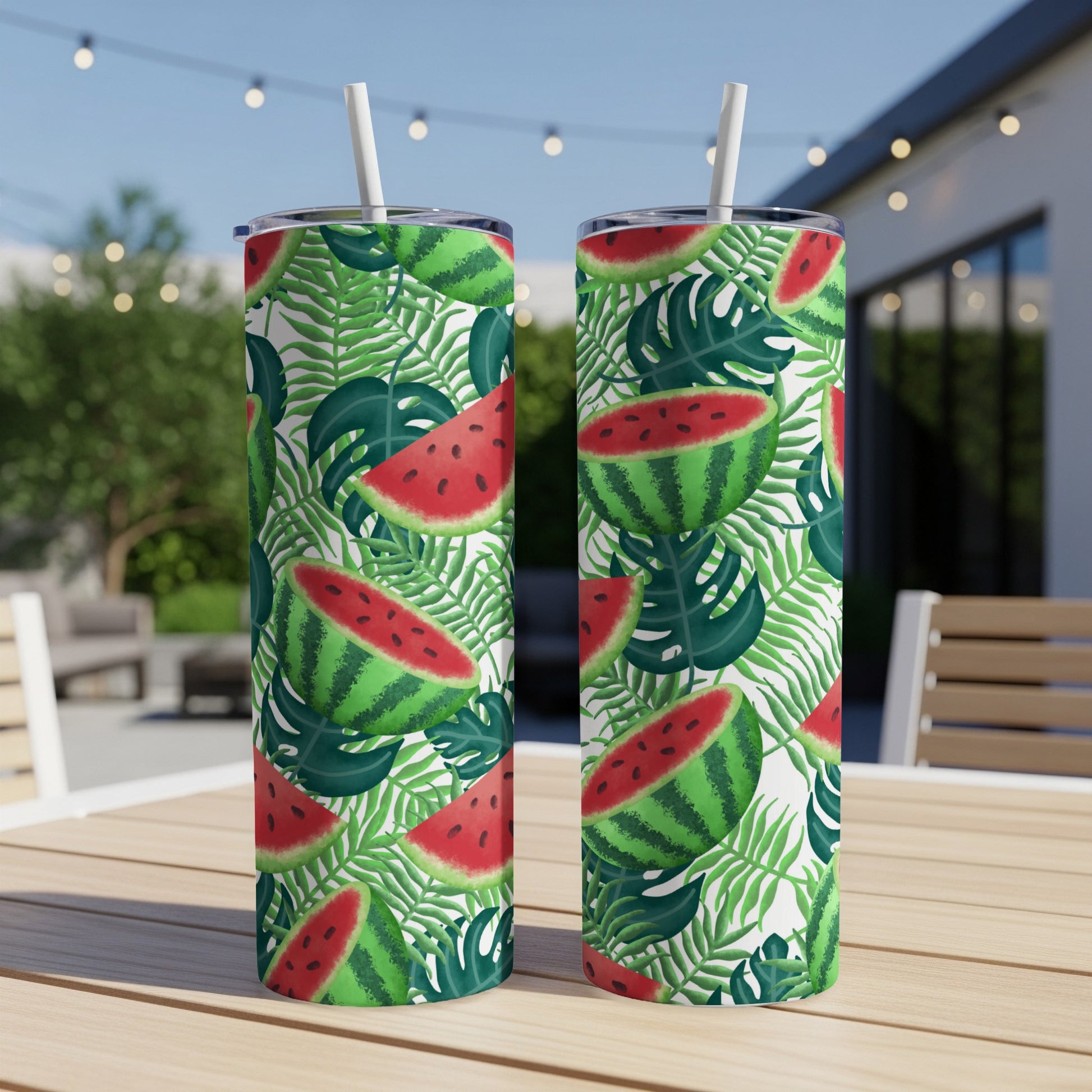 Two tumblers with watermelon and palm leaf pattern.