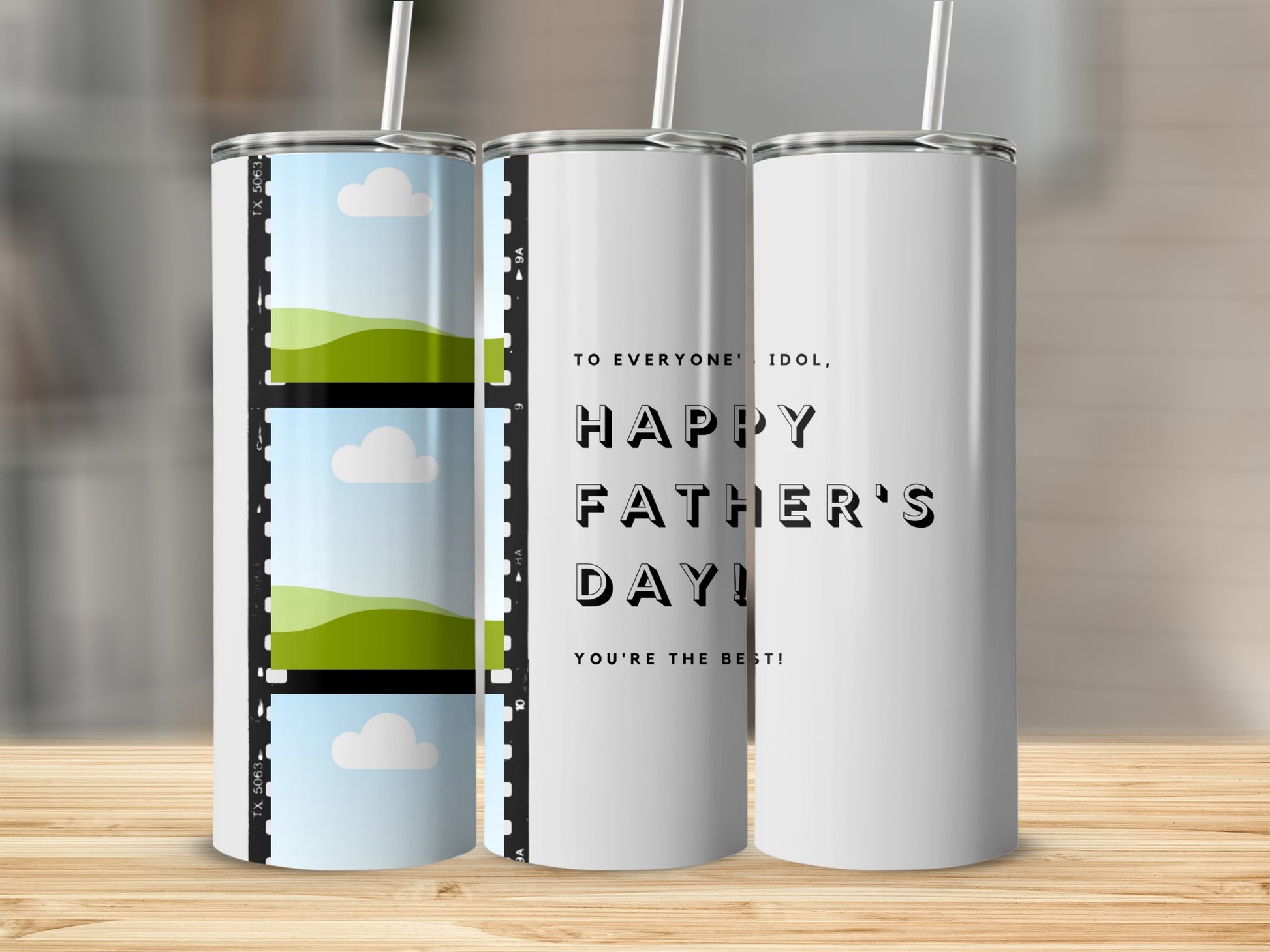 Three tumblers, one with film strip photo design, one with "Happy Father's Day" text.