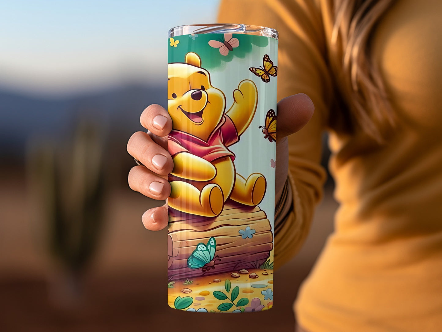Cute Winnie the Pooh Surrounded by Butterflies Tumblers