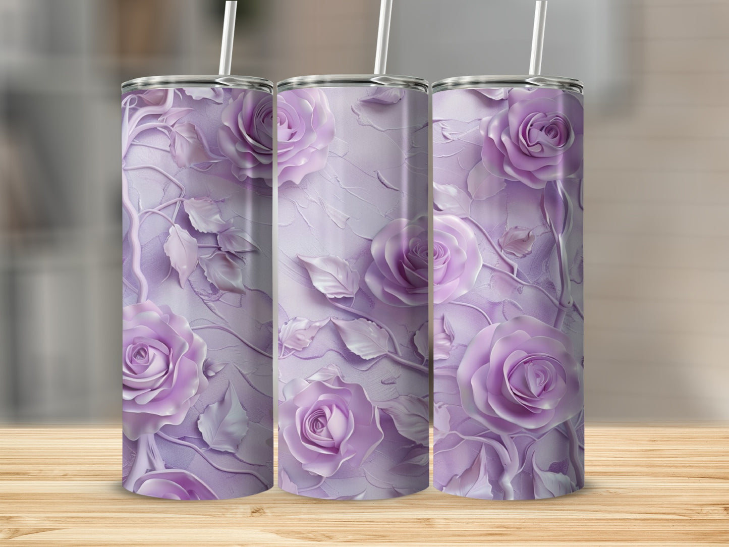 Three purple rose-textured tumblers with straws on a wooden surface.