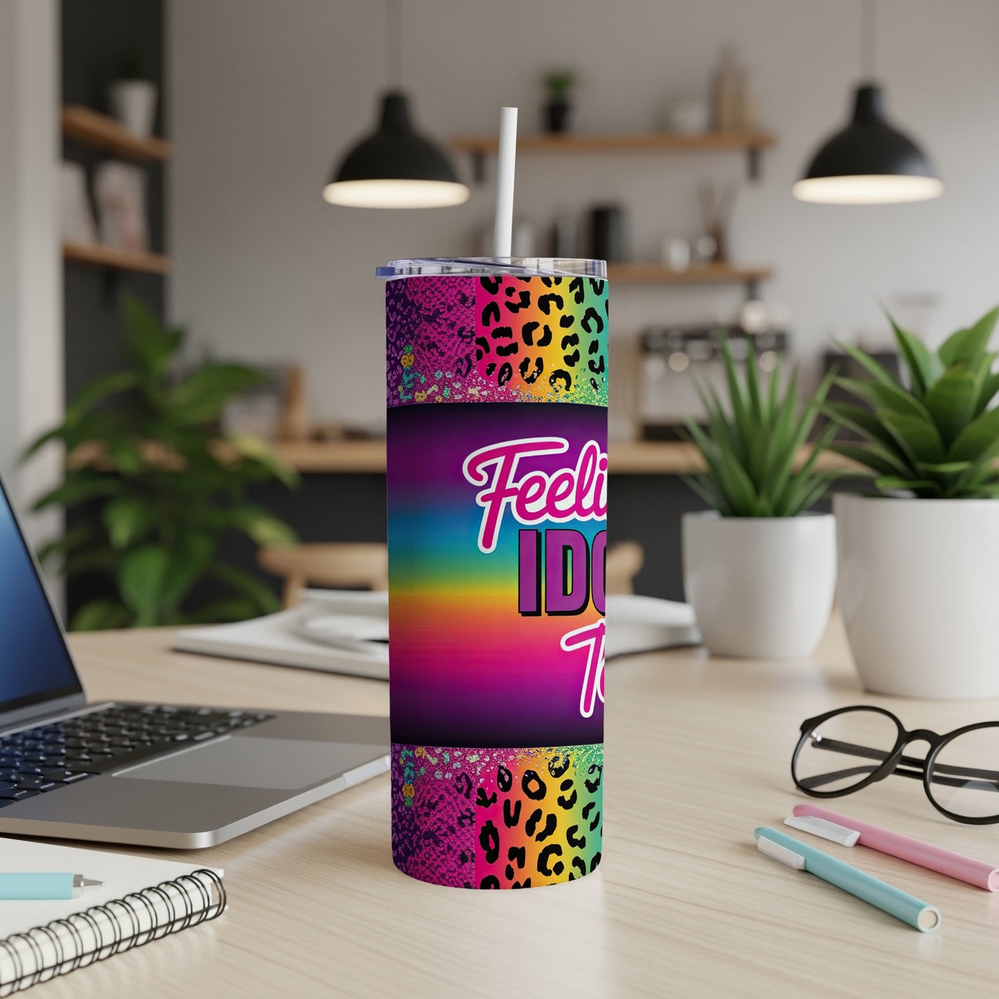 Tumbler with "Feeling IDK Today" text and leopard and snake print patterns.