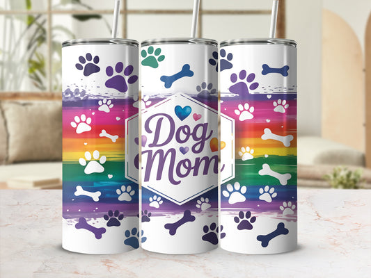 Three tumblers with "Dog Mom" text and paw print rainbow design.