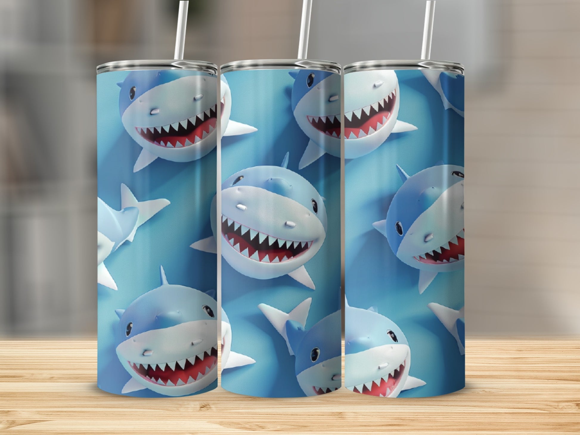 Three cartoon sharks with wide grins on blue tumblers.