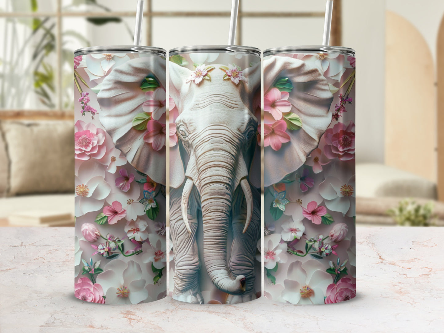 Three tumblers with an elephant and floral design.