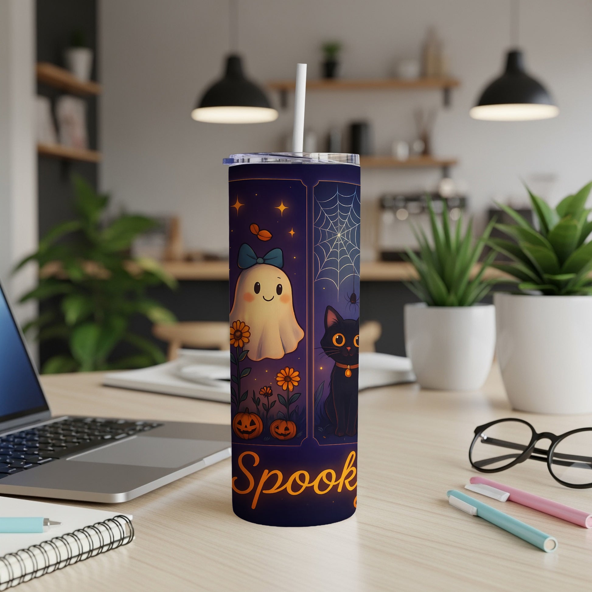Halloween tumbler with a ghost, black cat, pumpkins, and "Spooky" text.