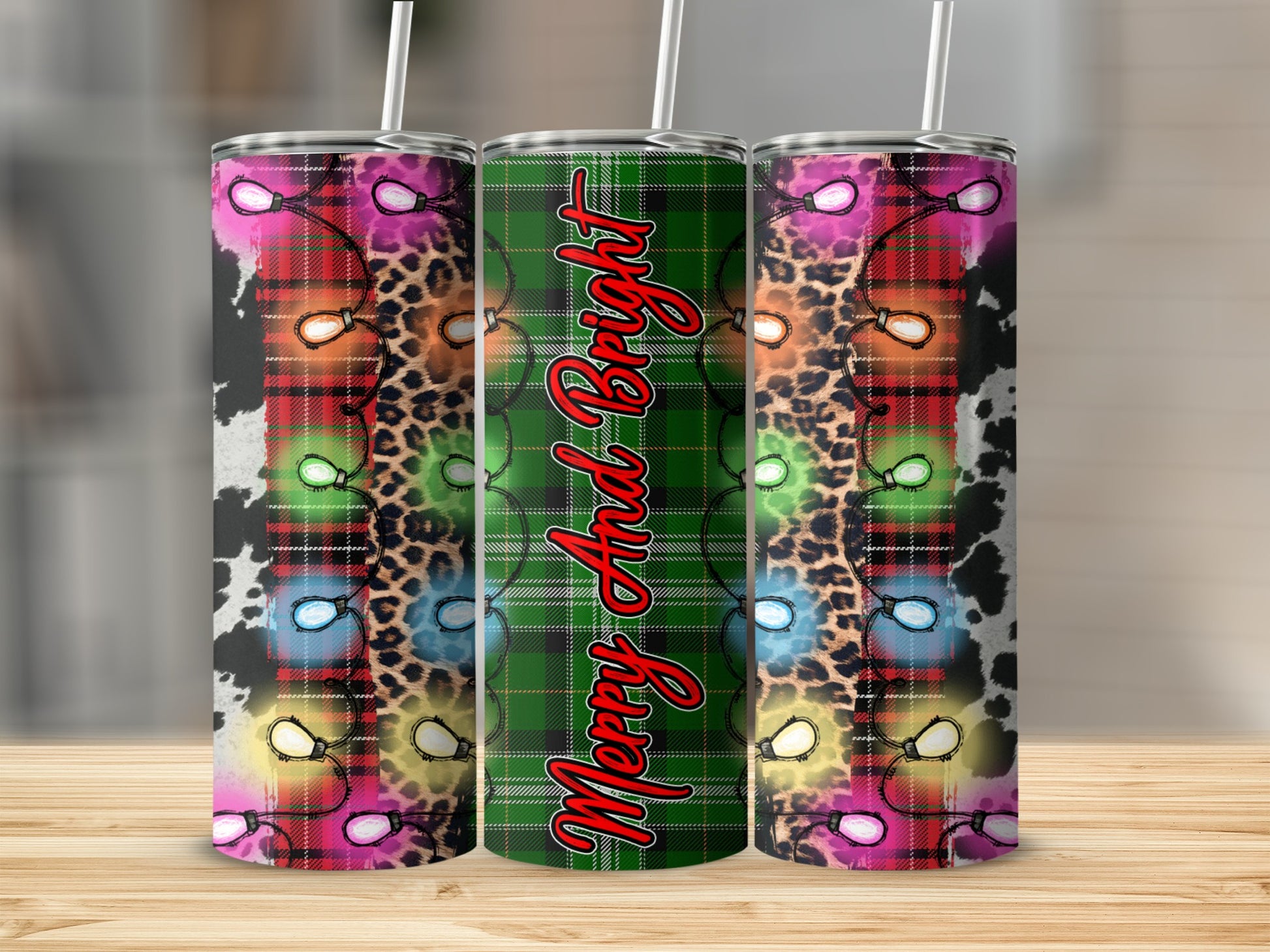 Three tumblers with plaid, leopard print, and Christmas lights designs.