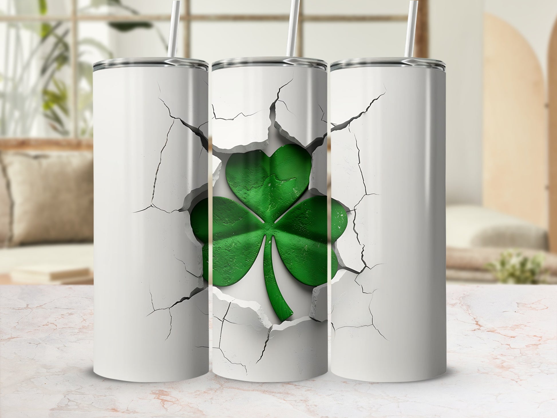 Three white tumblers with cracked white exteriors revealing a green shamrock.