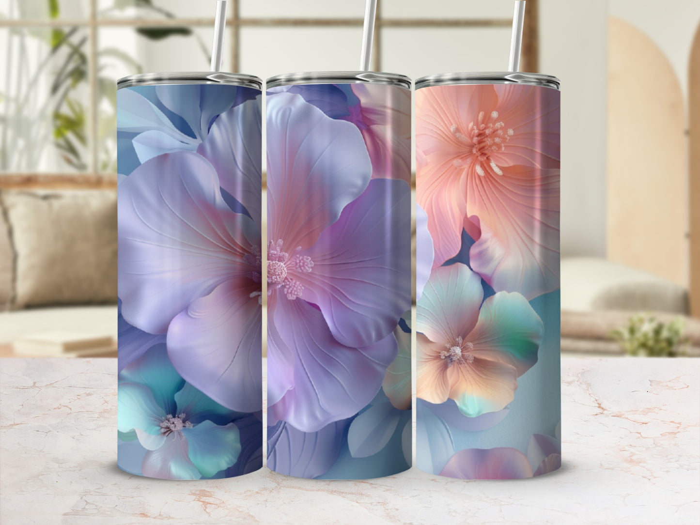 Three tumblers with floral patterns in purple, pink, and blue hues.