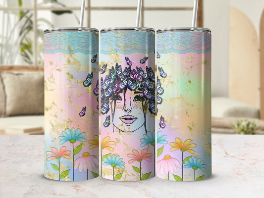 Three tumblers with floral and butterfly designs, featuring a woman's face.