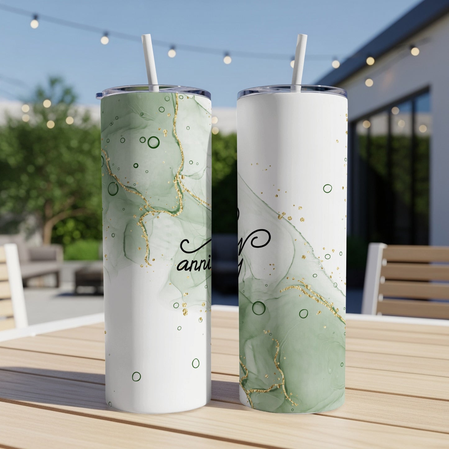 Two tumblers with green marble design and "Anniversary" text.