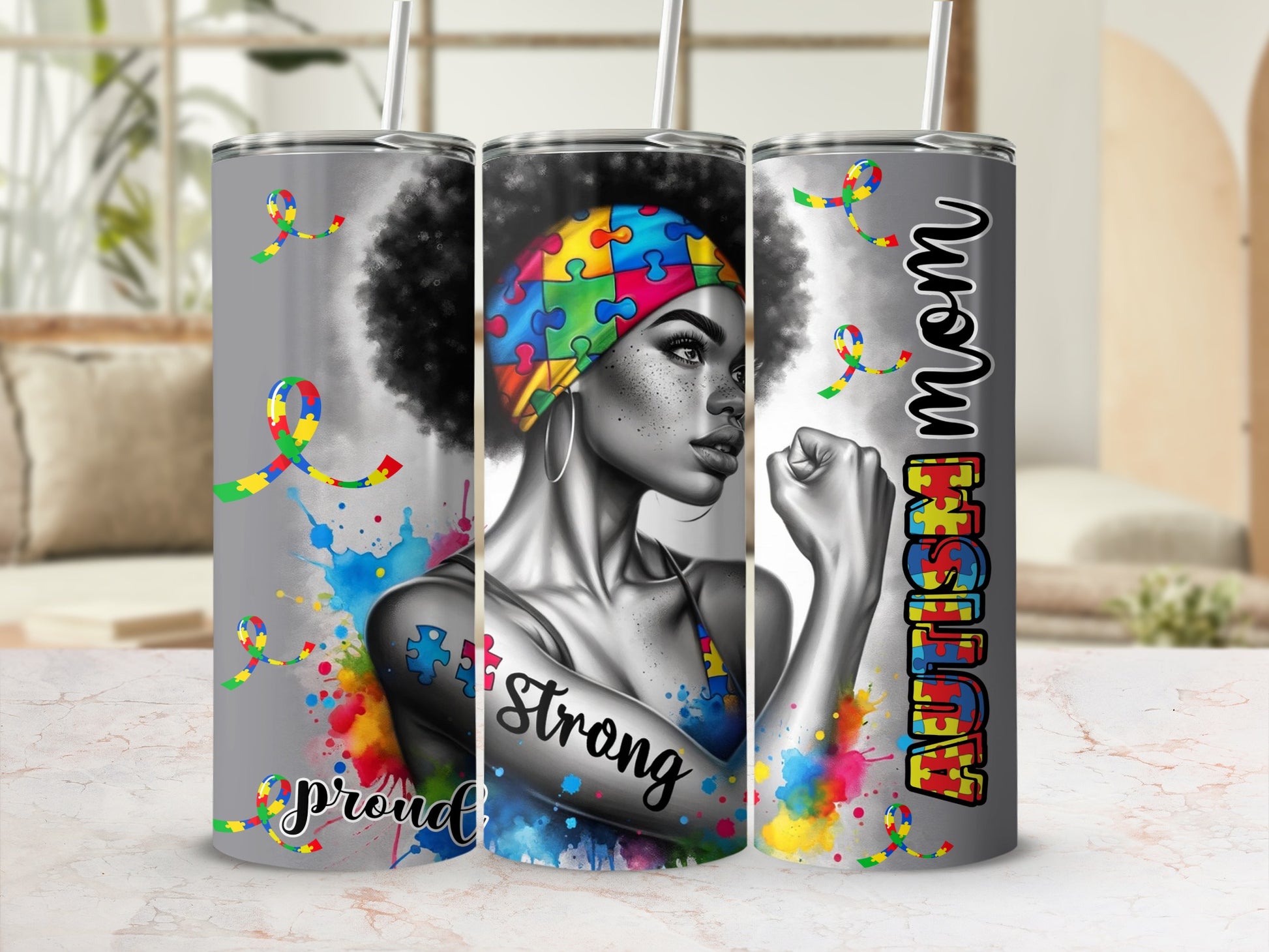 Three tumblers with autism awareness ribbon and "Proud Mom" text.