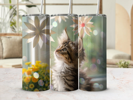 Three tumblers featuring a kitten looking up, surrounded by floral graphics.