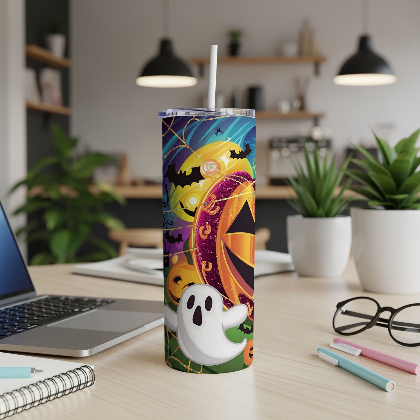 Halloween tumbler with pumpkins, bats, and a ghost.