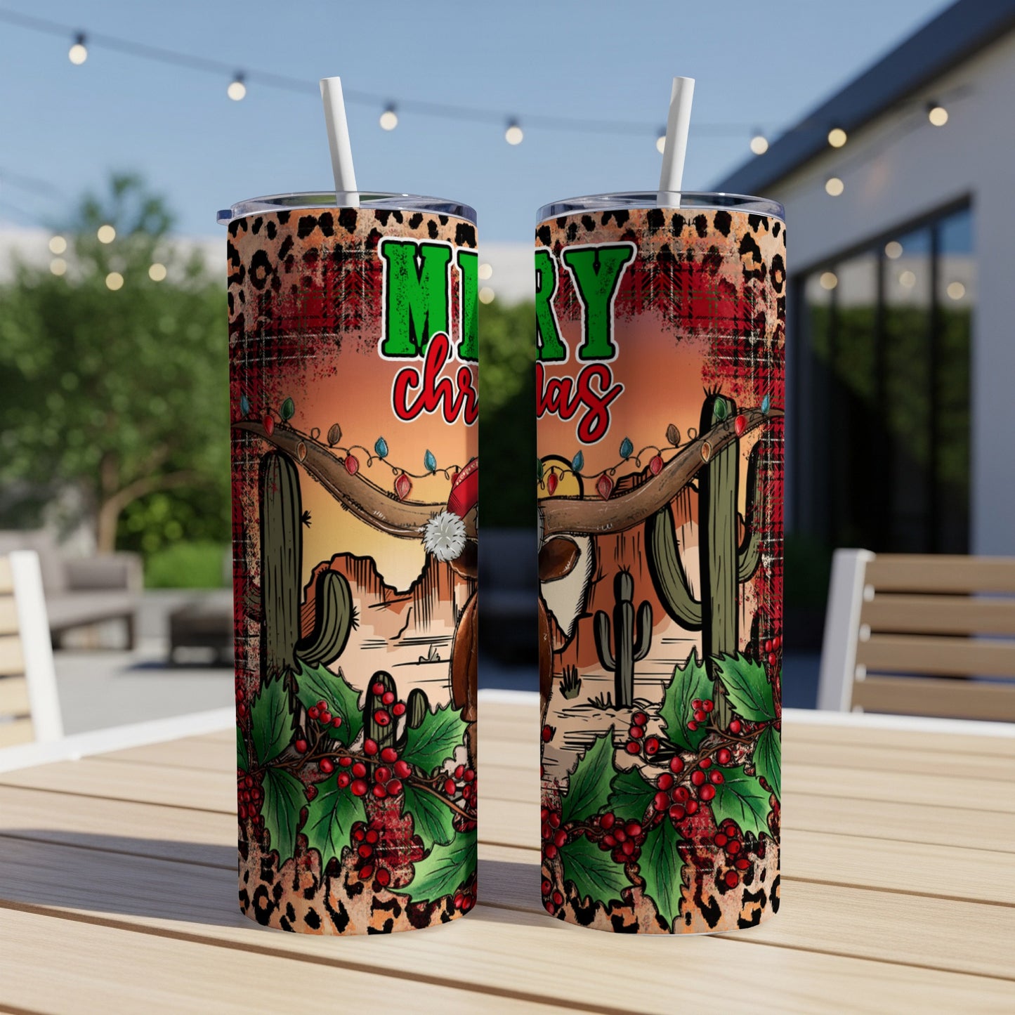 Cowboy hat and reindeer on tumbler with Merry Christmas text and desert background.