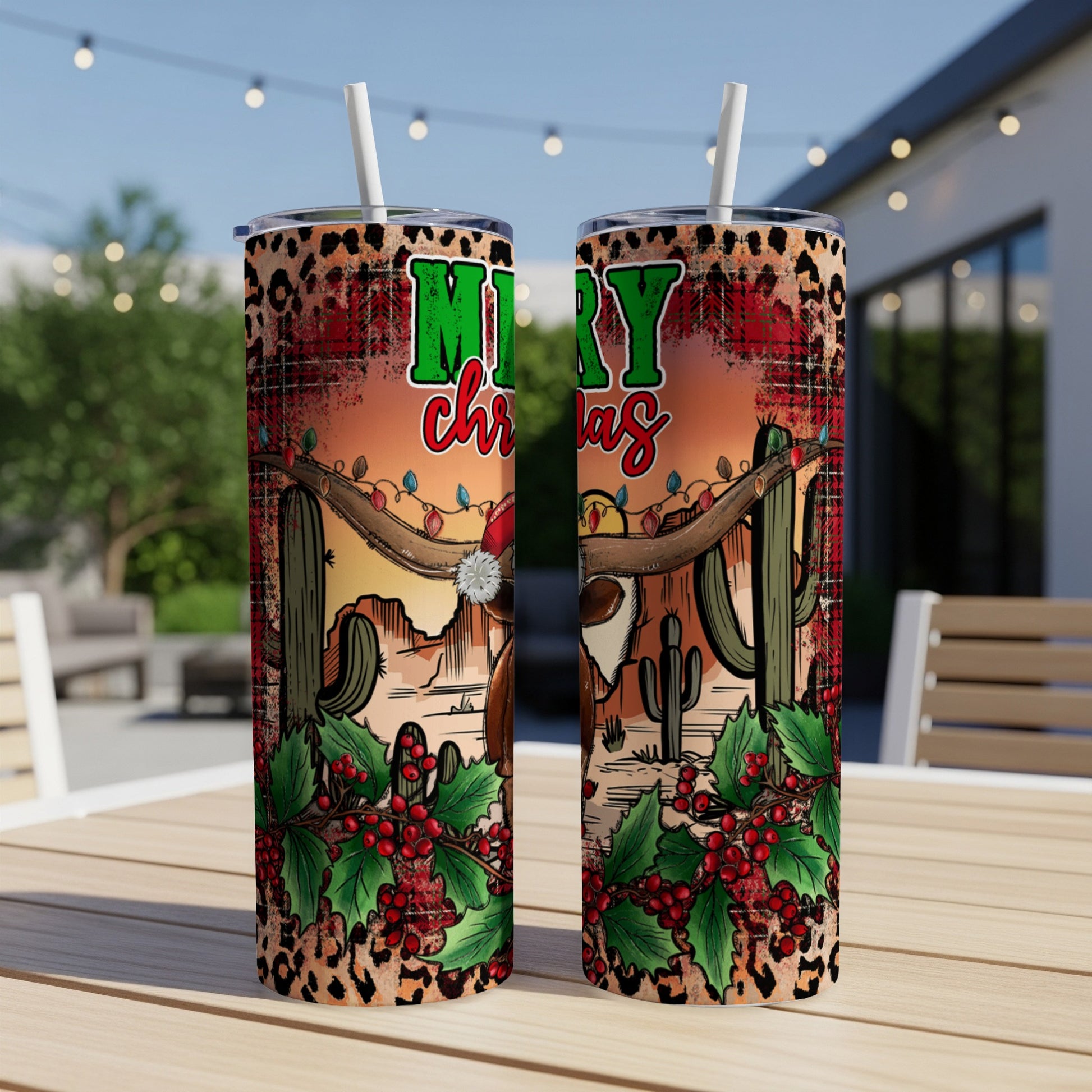 Cowboy hat and reindeer on tumbler with Merry Christmas text and desert background.