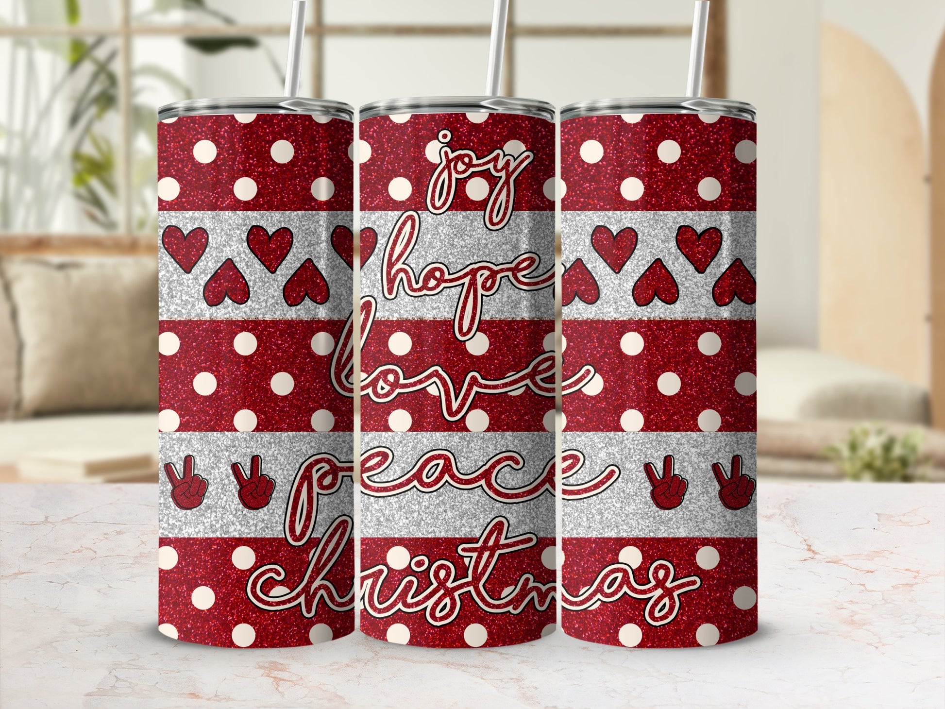 Red and white polka dot tumbler with "joy, hope, love, peace, Christmas" text and hearts.