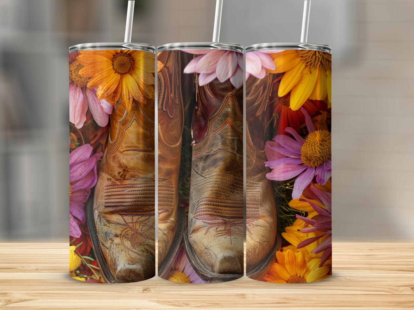 Cowboy boots and colorful flowers on a tumbler.