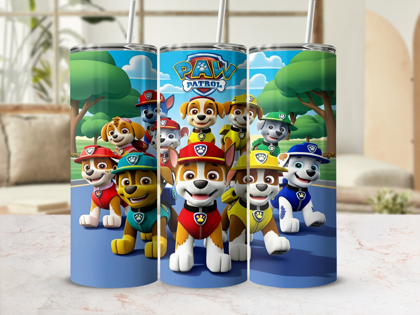 Paw Patrol characters on a blue tumbler with trees and a fence background.