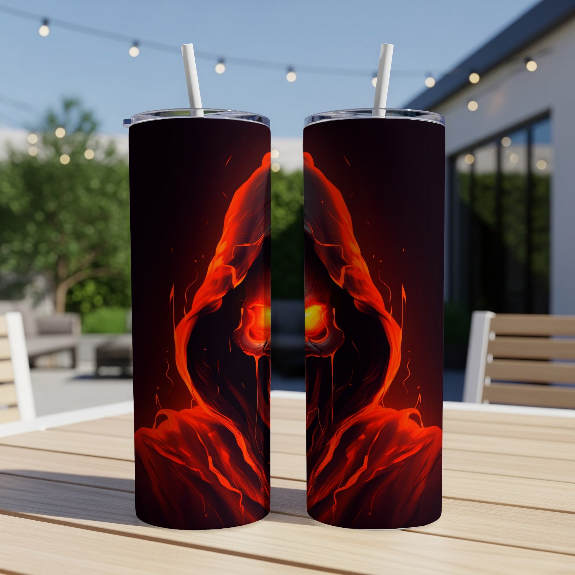 Two tumblers with a hooded, fiery figure with glowing eyes design.