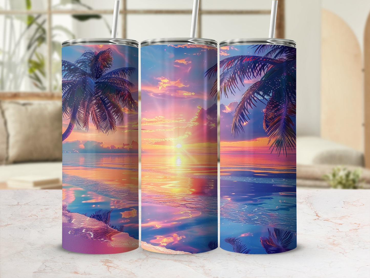 Three tumblers with a vibrant sunset over water and palm trees scene.