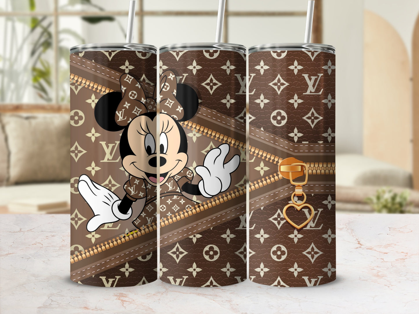 Minnie Mouse on a brown LV-style pattern tumbler with zipper detail.