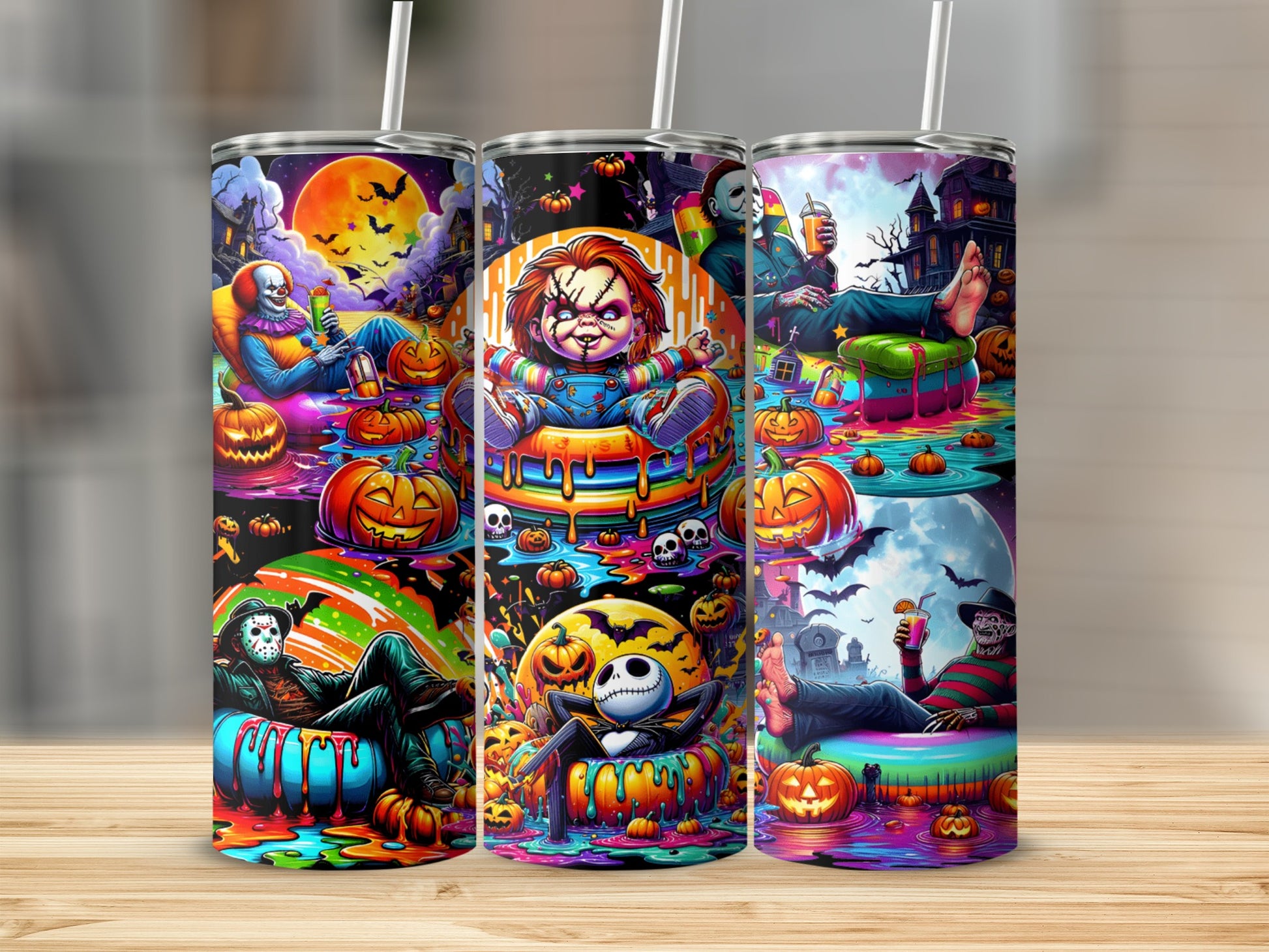 Three tumblers feature Halloween movie villains with pumpkins, bats, and a spooky moon.