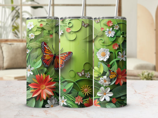 Green tumbler with butterflies and floral designs.