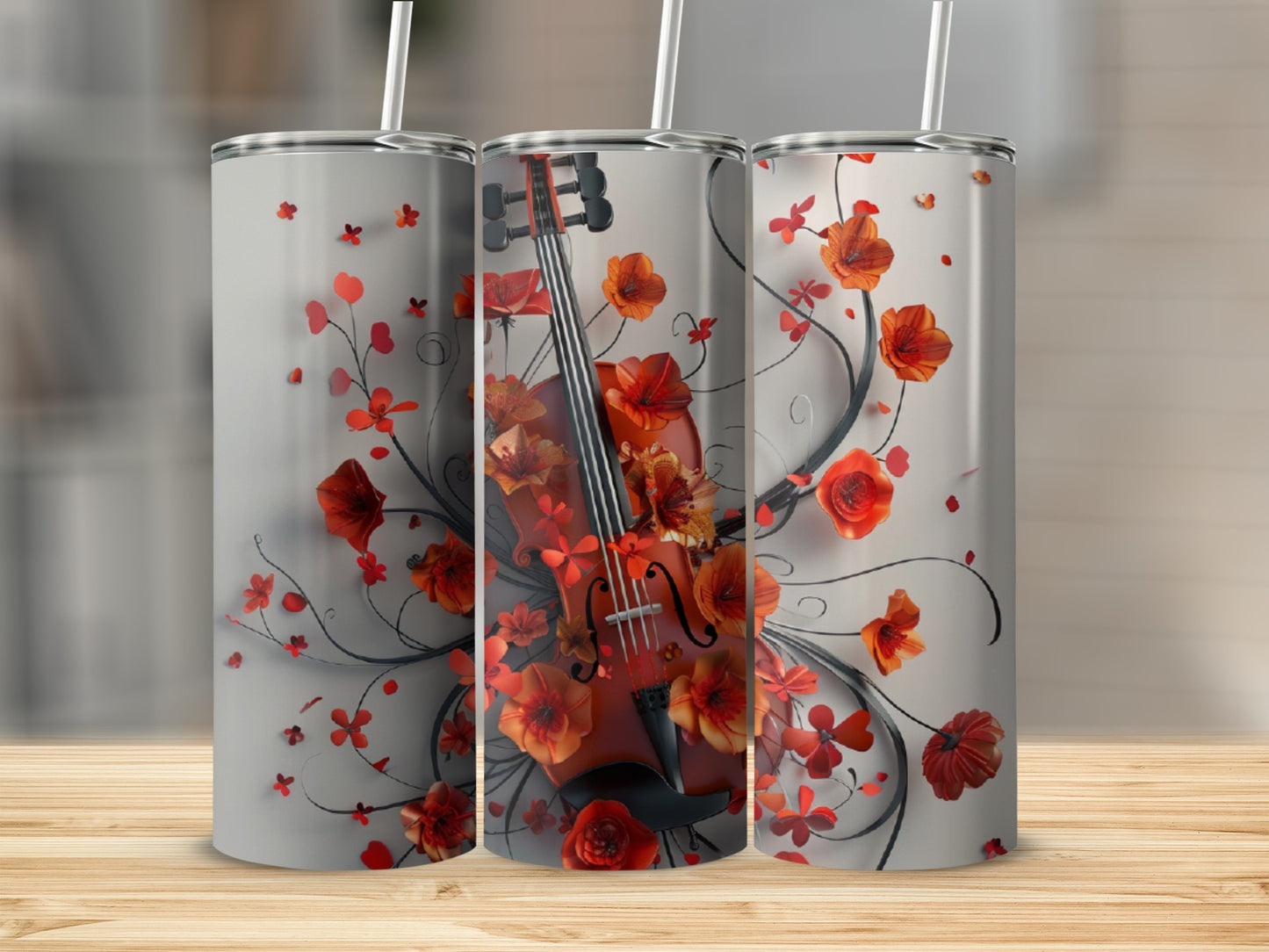 Floral violin design on three insulated tumblers with straws.