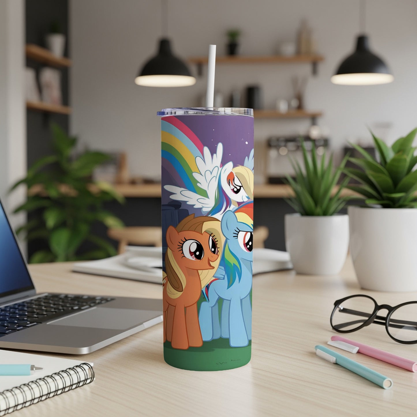 Rainbow Dash, Applejack, and Rarity from My Little Pony on a tumbler.