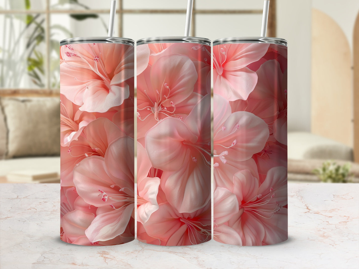 Three tumblers with a large pink floral pattern.