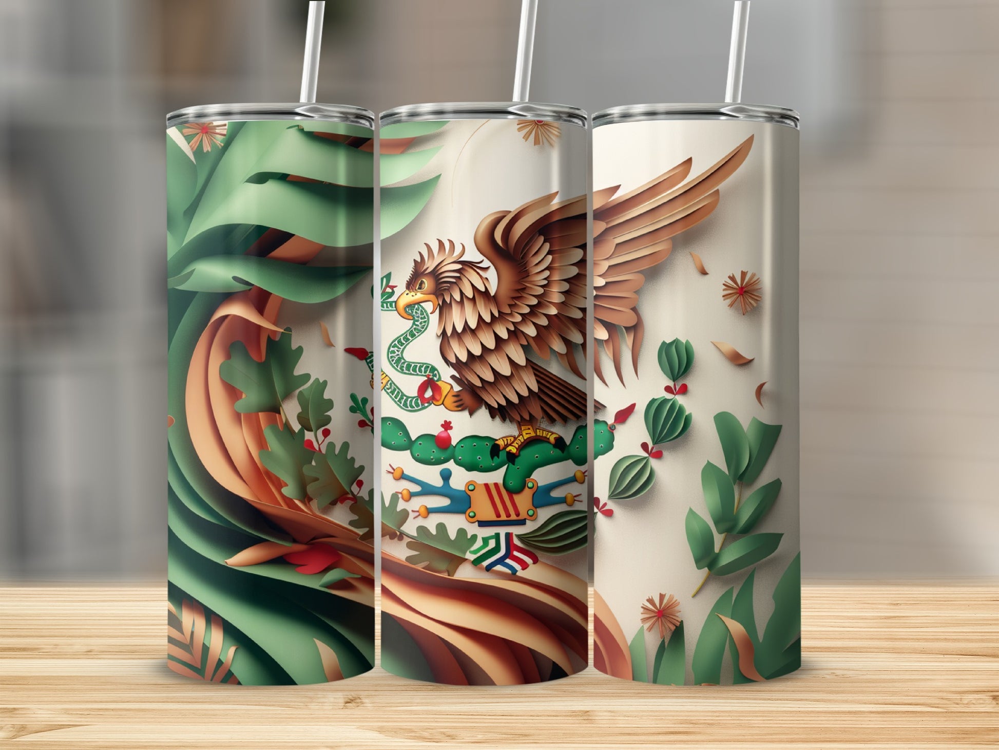 Three tumblers with a Mexican eagle emblem and lush green foliage.