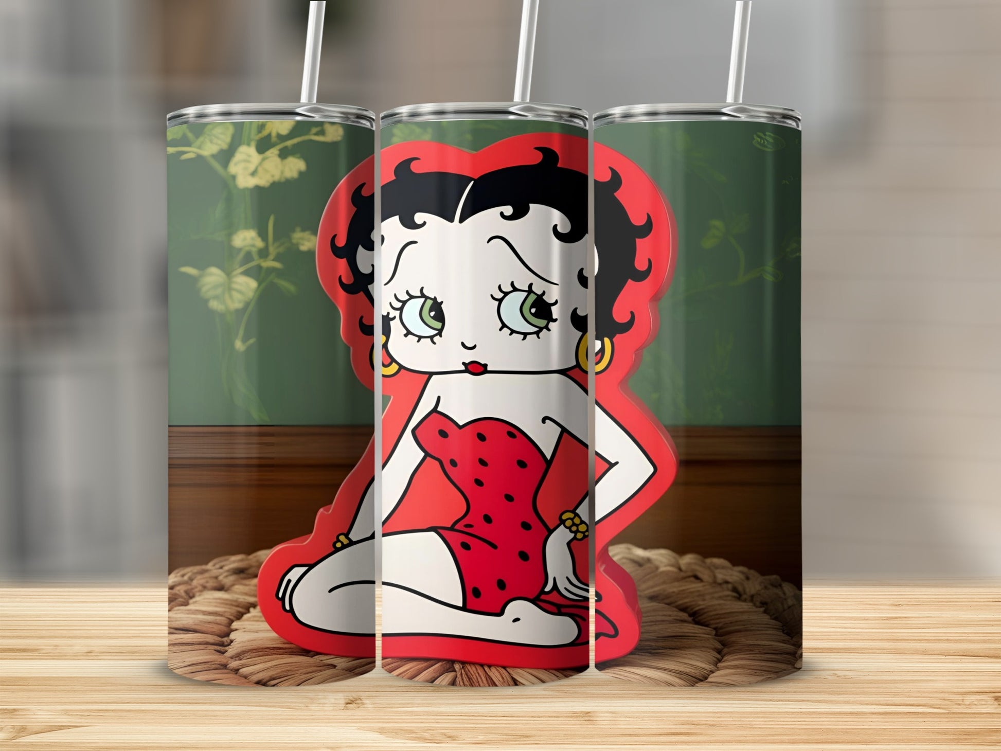Betty Boop in red dress on tumbler with green background.