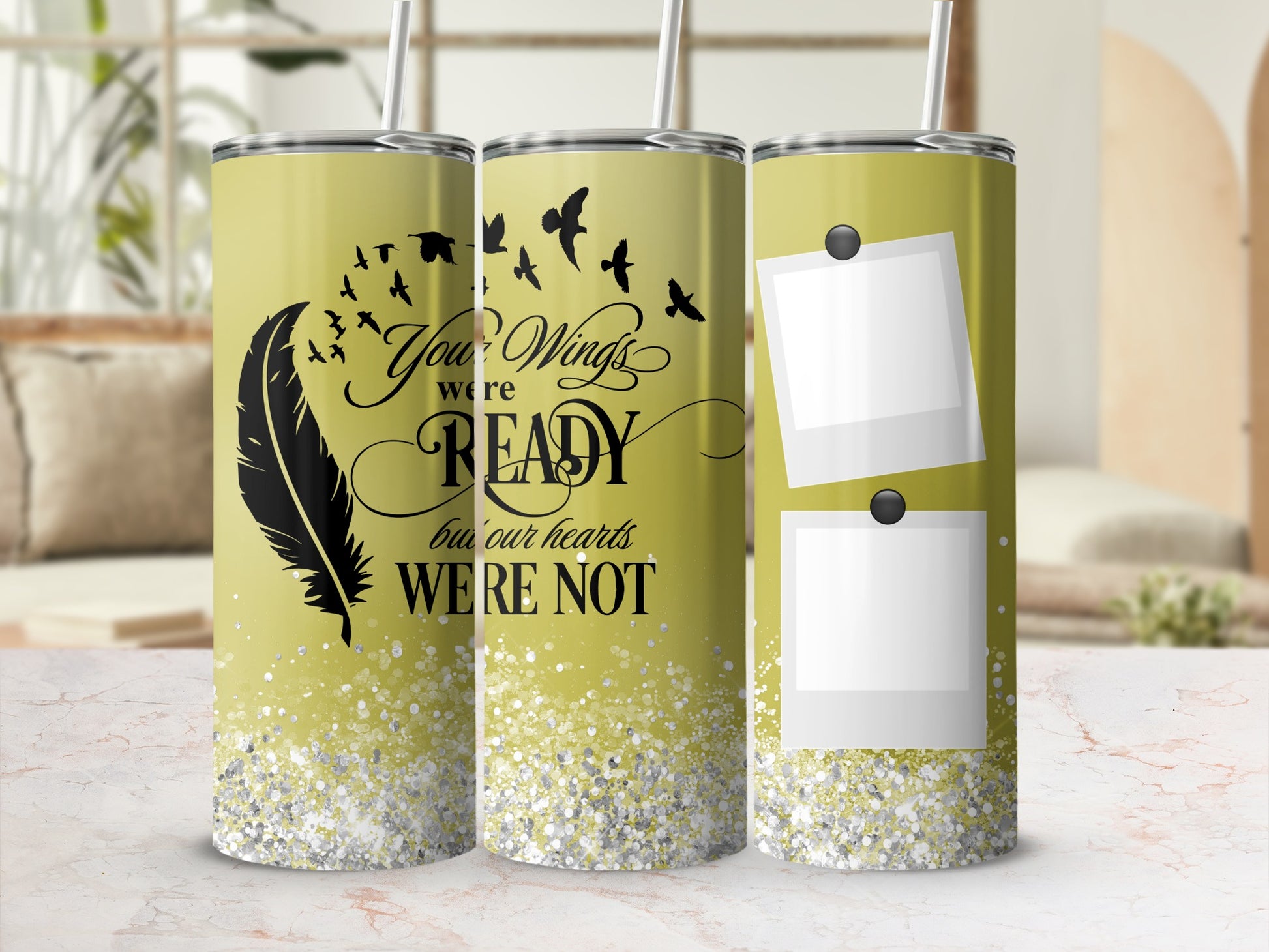 Yellow tumbler with feather, birds, text, and photo frames.