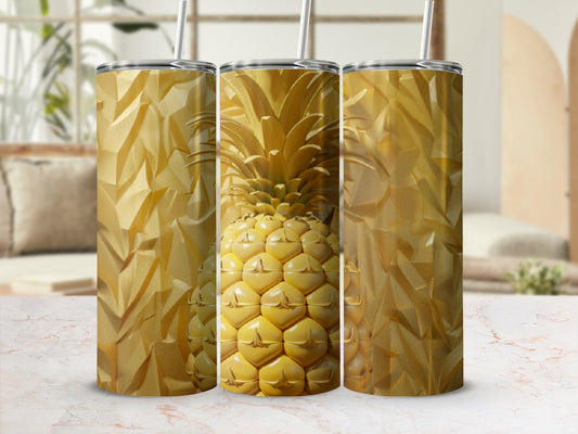 Gold pineapple pattern on three seamless tumblers with straws.