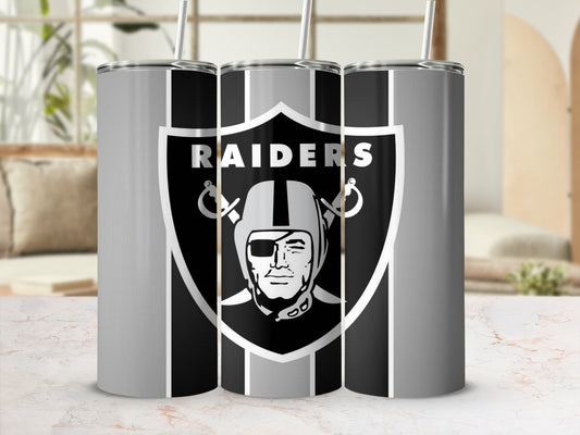 Las Vegas Raiders logo on three silver and black striped tumblers with straws.