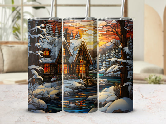 Winter cabin scene with snowy trees and a warm glow from windows.