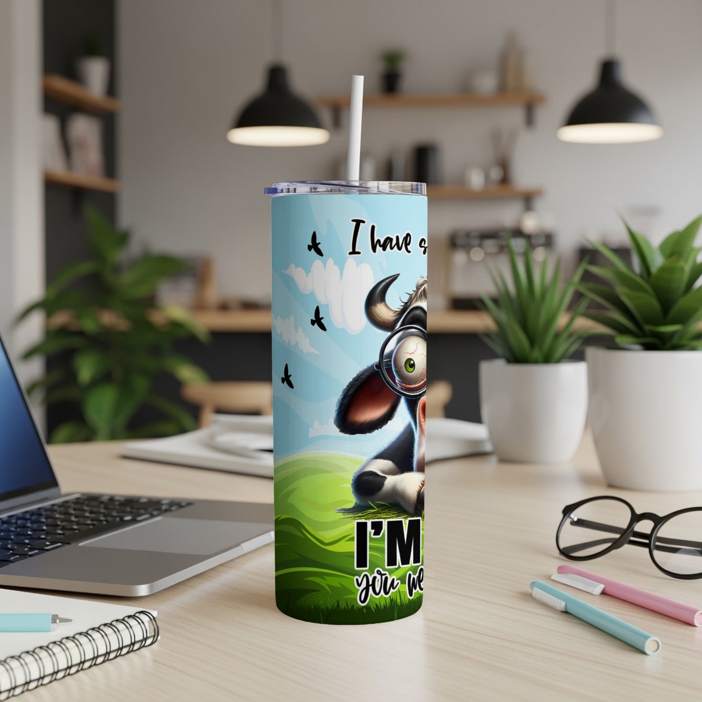 Cartoon cow with glasses on a tumbler, saying "I have a good feeling about this."