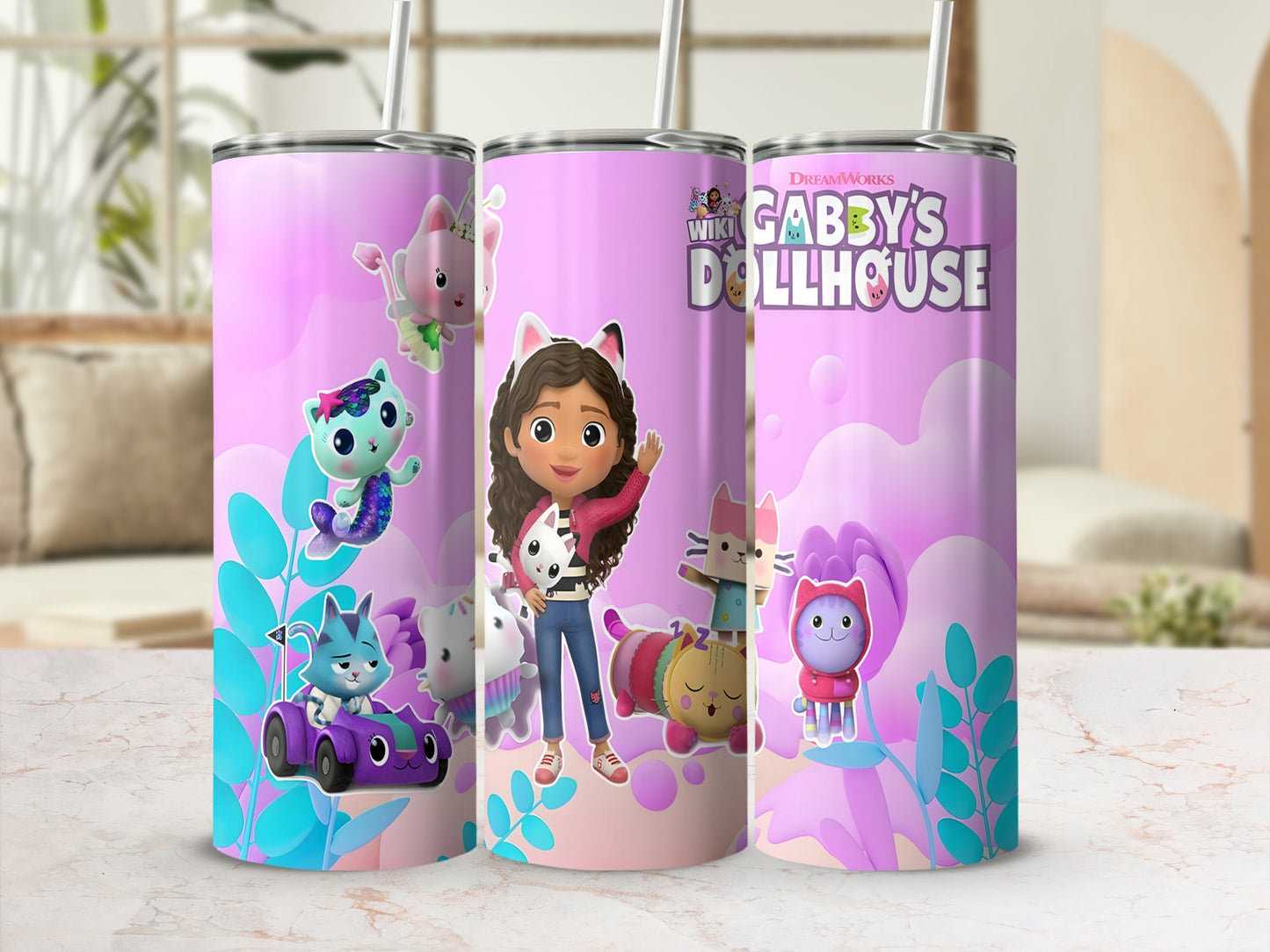 Gabby's Dollhouse Gabby and friends on a purple tumbler with straw.
