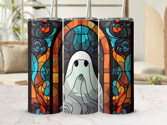 Stained glass tumbler with ghost design and straw.