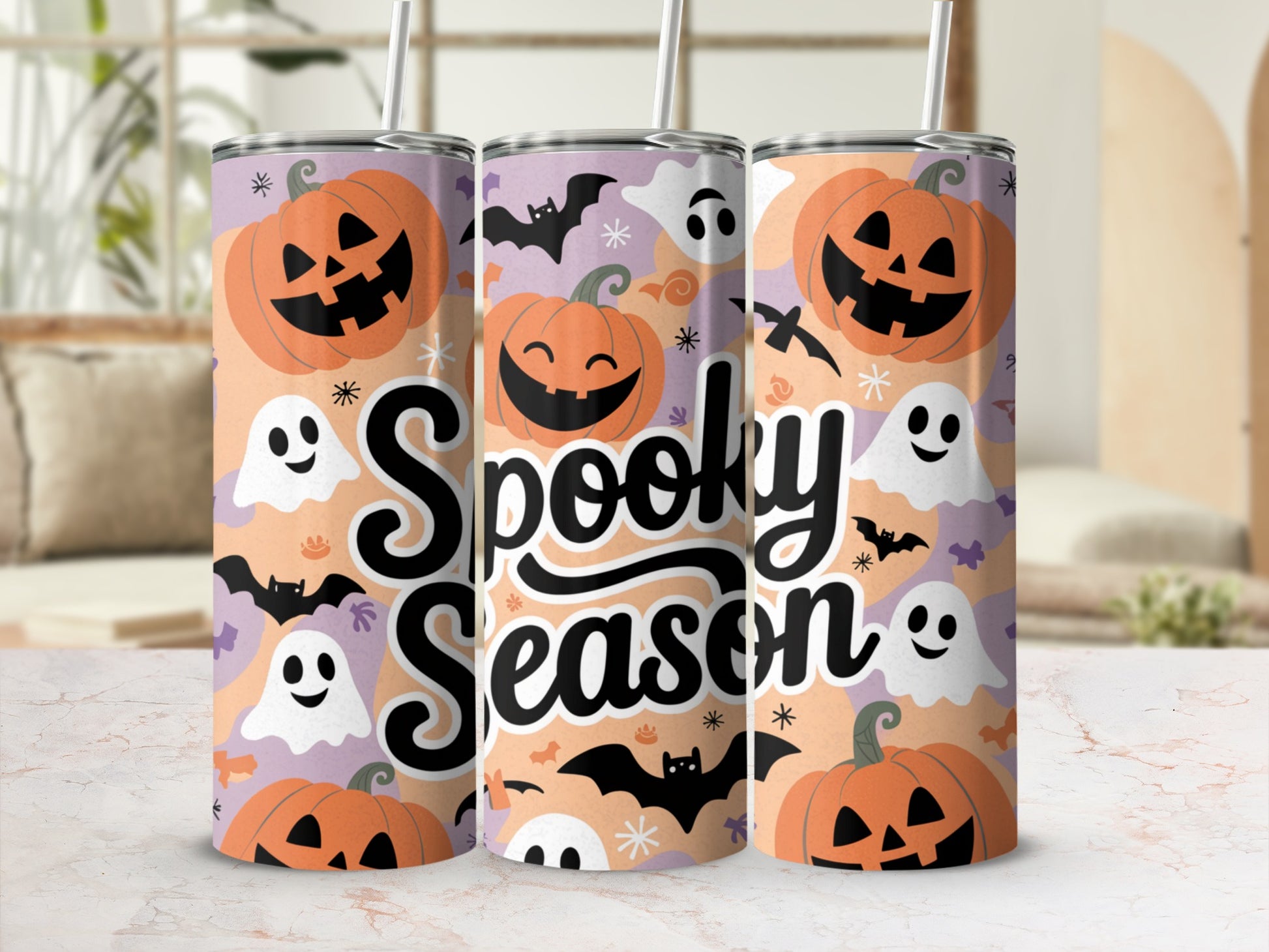 Tumblers with "Spooky Season" text, pumpkins, ghosts, and bats.