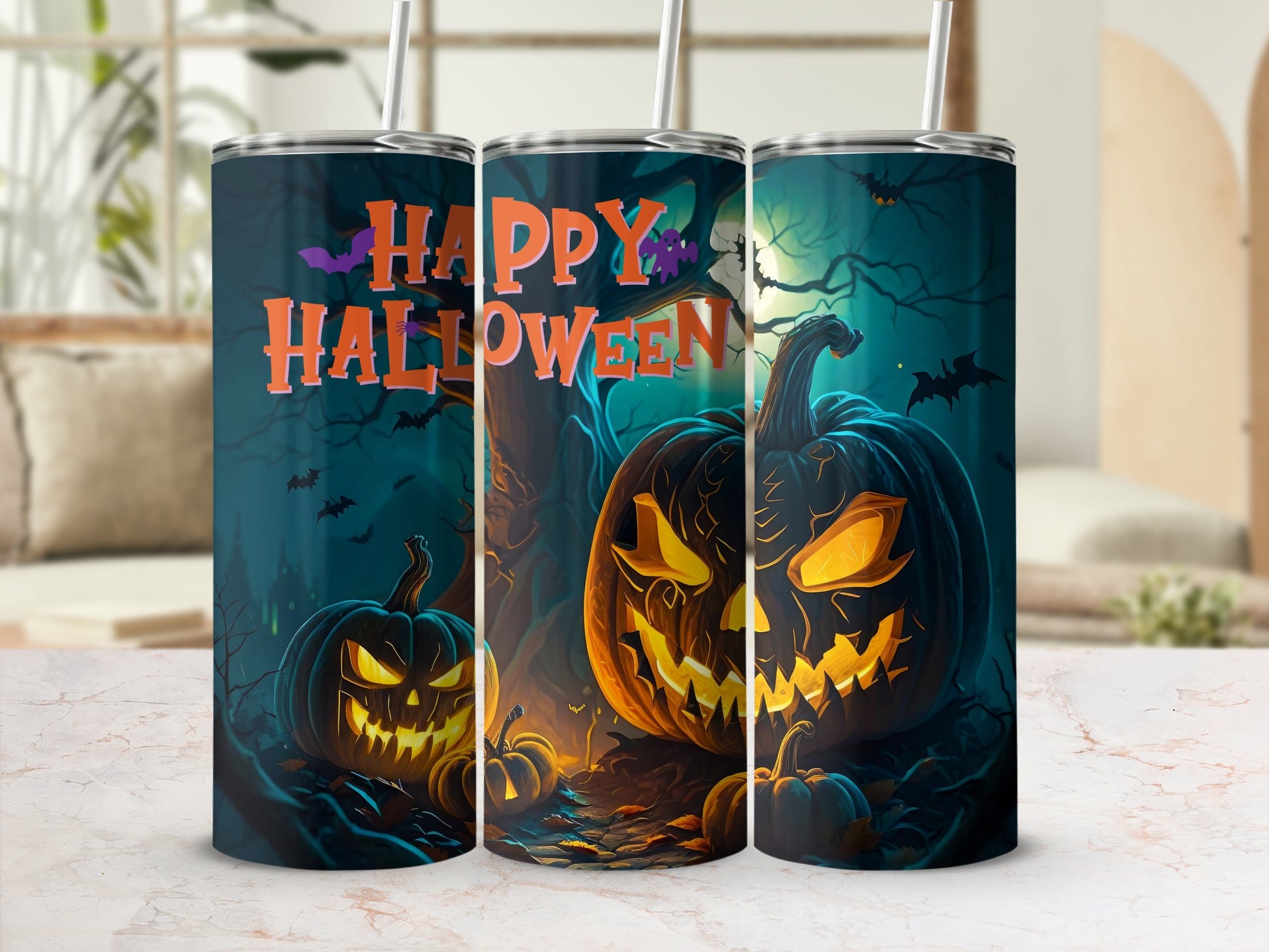 Three tumblers with "Happy Halloween" text and spooky jack-o'-lantern designs.