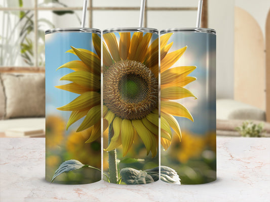 Three tumblers featuring a close-up of a sunflower on a blurred floral background.