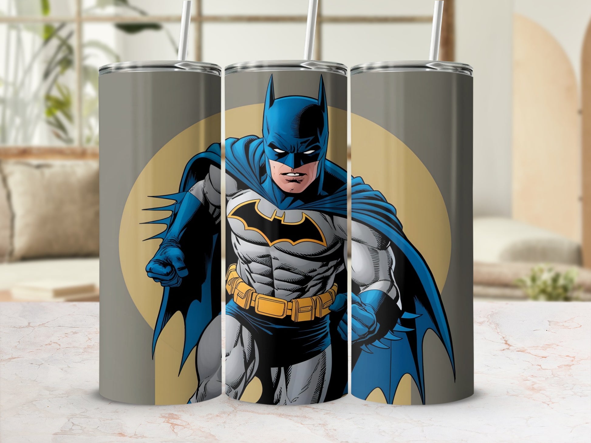 Batman superhero illustration on a gray tumbler with yellow accents.