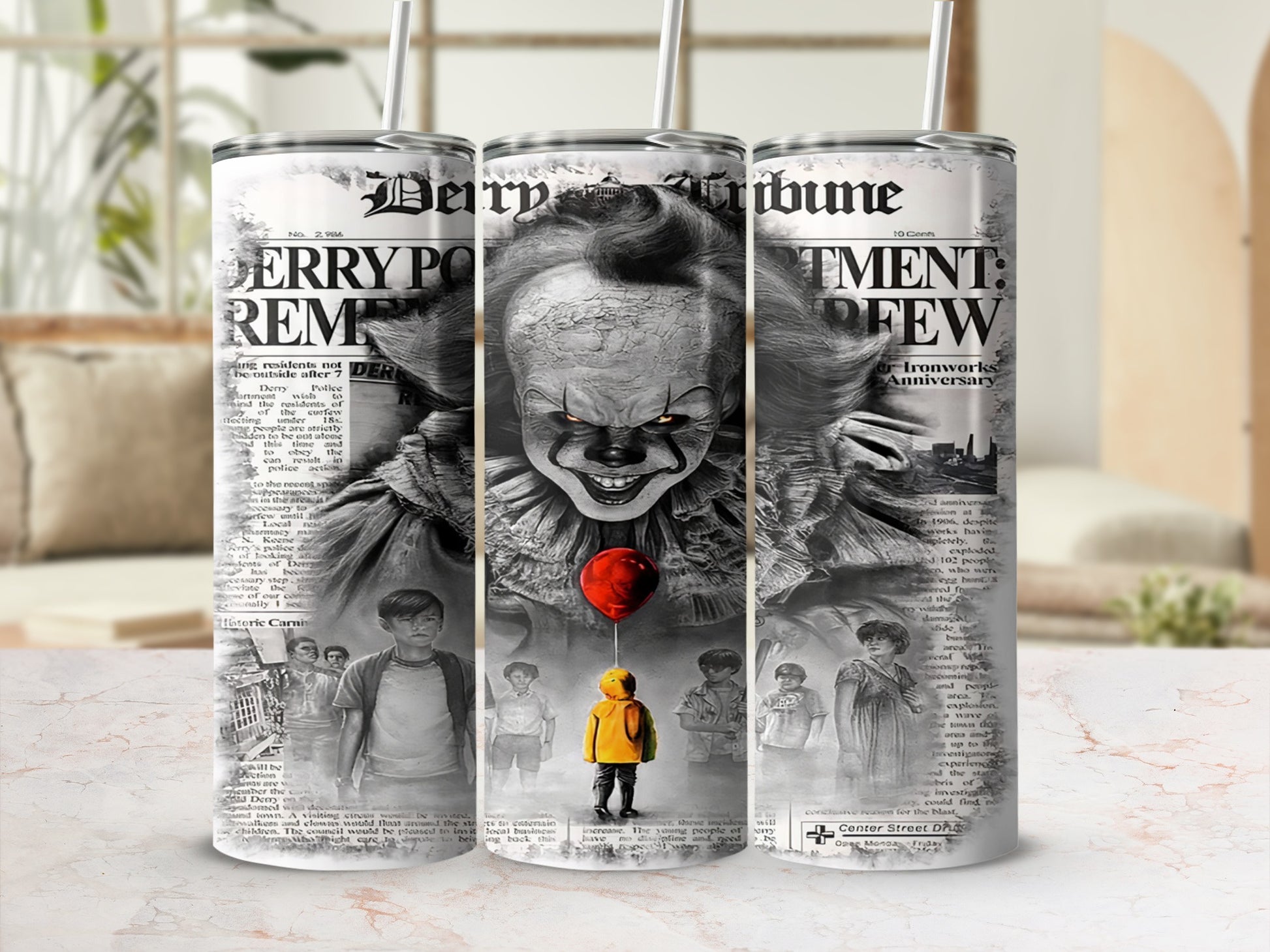 Pennywise the Clown and children on newspaper-themed tumblers.