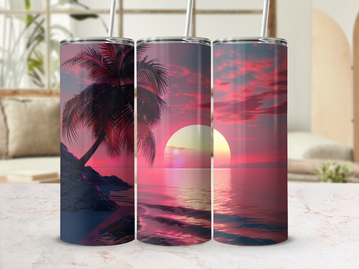 Three tumblers with a sunset over a beach and ocean scene.